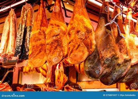 Jamon Serrano Ham Legs Hanging in Traditional Spanish Market Stock ...