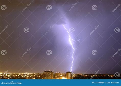 Lightning Streak from a Thunderstorm Cloud at Night in a Rural Setting ...