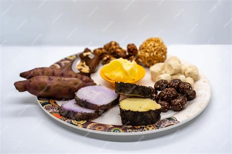 Maghe sankranti makar festival food plate of muri ladoo sesame ladoo ...