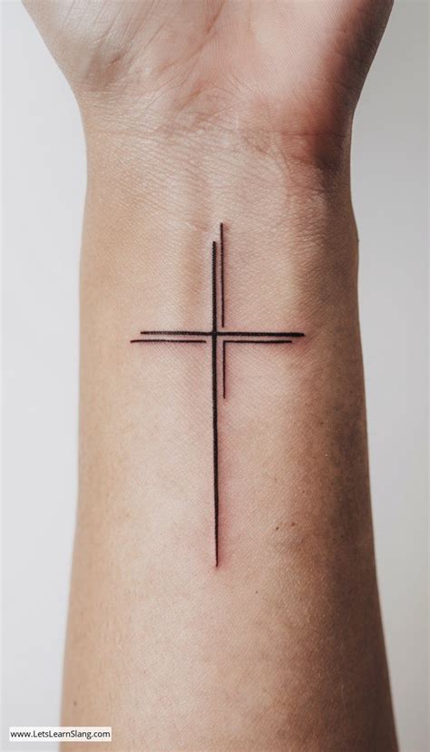 Minimalist Cross Wrist Tattoo in 2025 | Cross tattoo on wrist, Wrist ...
