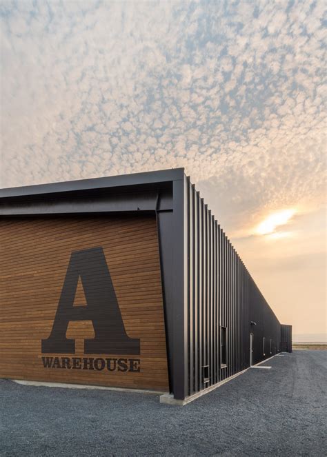 Woodinville Whiskey Co. | Metal building designs, Warehouse design ...