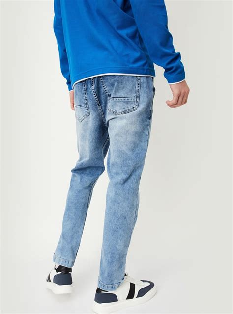 Buy Men Carrot Fit Washed Jeans Online at just Rs. 1499.0 ...