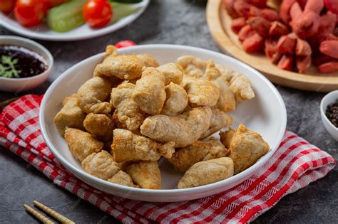 Deep fried fish ball on the dark surface. | Premium Photo
