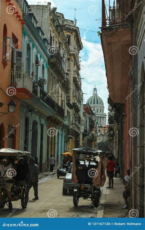 04/04/2016: Havana, Cuba: a Busy Street in the Socialist Country Capital with Rikshas and the ...