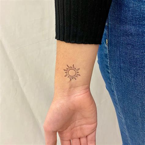 Sun Tattoo Wrist