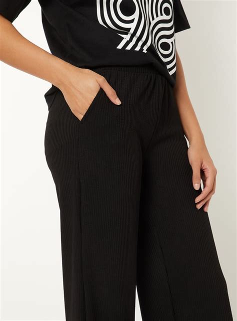 Buy Women Ribbed Wide Leg Sports Track Pants Online at just Rs. 699.0 ...