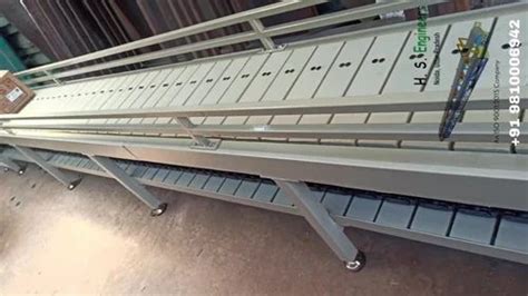 Chain Conveyors - Slat Chain Conveyors Manufacturer from Greater Noida