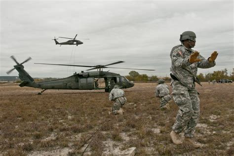 Fort Hood Air Assault School conducts rappel testing out of UH-60 Black ...