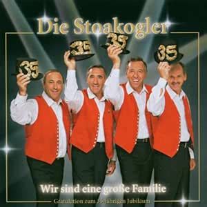 Wir Sind Eine Grosse Fami: Stoakogler: Amazon.in: Music}
