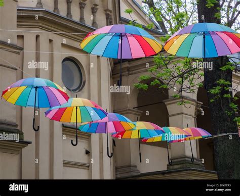 Krakow, Poland - May 2021: Street with rainbow-colored umbrellas. Cracow, European Union Stock ...