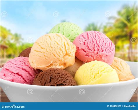 Bowl of Colorful Ice Cream Balls on Natural Stock Image - Image of ...