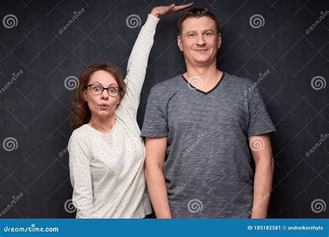Shot of Funny Short Woman and Tall Man Stock Image - Image of height ...