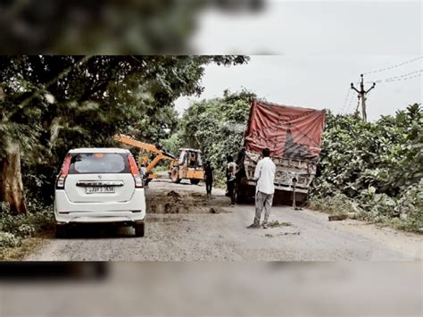One-foot potholes on the road from Handod to Ratanpur village in ...