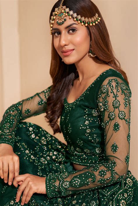 Rich Green Stone Embroidered Silk And Net Semi-stitched Lehenga Set ...