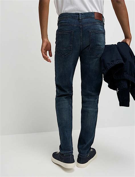 Buy Tapered Fit Vintage Wash Stretch Jeans at Marks & Spencer