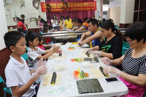 新昌小学幼儿园开展“巧手做寿司”亲子活动