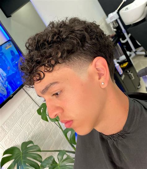 15 Haircuts for Guys with Curly Hair | Beautycon.com