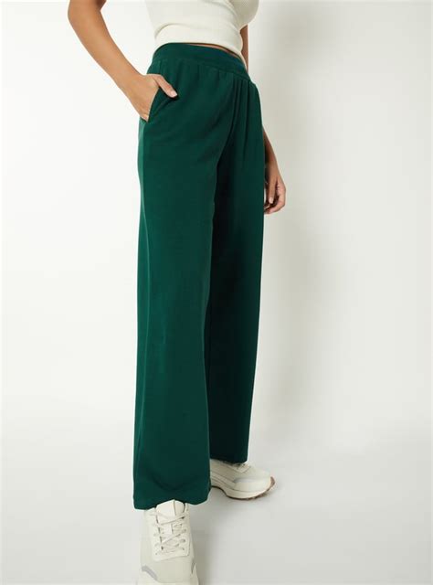 Buy Women Solid Athleisure Track Pants Online at just Rs. 699.0 ...