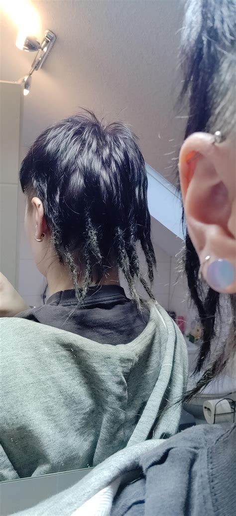 Got 11 dreads done today I'm letting my mullet grow and since I wanted ...