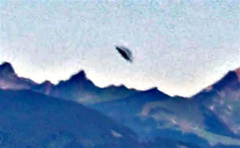 UFO spotted leaving Alps Mountain in Switzerland; conspiracy theorists ...