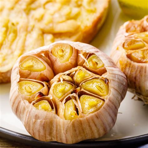 Incredibly Easy Oven Roasted Garlic (Whole Roasted Cloves) - Nurtured Homes