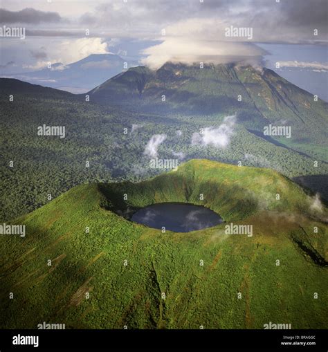 Aerial view of Mount Visoke (Mount Bisoke), an extinct volcano straddling the border of Rwanda ...