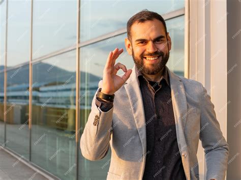 Premium Photo | Radiant charisma the impeccable style of the smiling ...