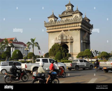 Traffic in front of Patuxai Gate, Victory Gate, Concrete Monument, Lane Xang Avenue, Vientiane ...