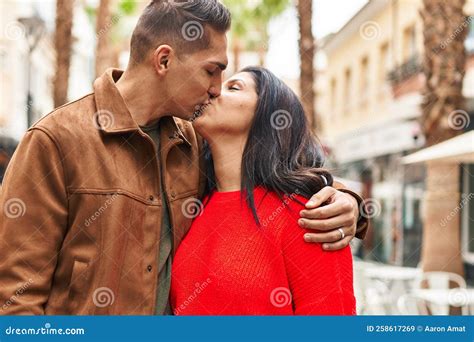 Man and Woman Couple Kissing and Hugging Each Other at Street Stock ...