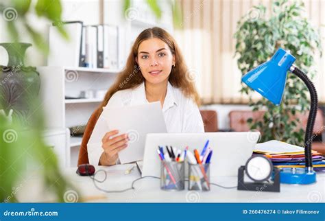 Female Clerical Worker Sitting at Desk in Office Stock Photo - Image of italian, formal: 260476274