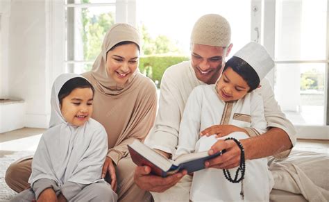 Premium Photo | Happy family muslim parents or children reading book ...