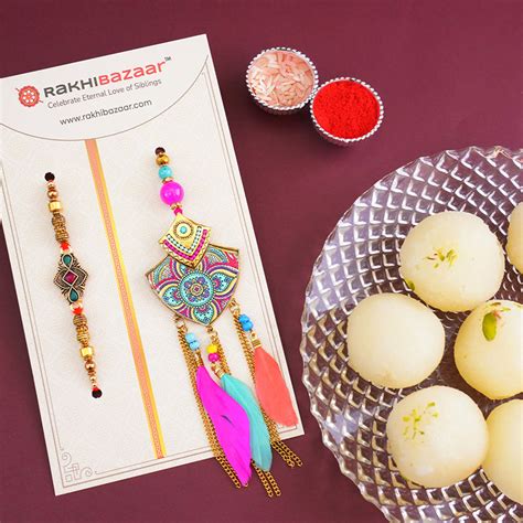 Send Fancy Bhaiya Bhabhi Rakhi with Haldiram Rasgulla Online