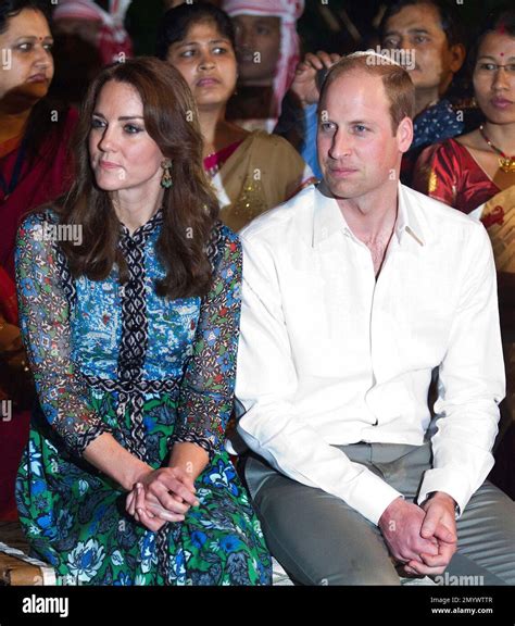 Britain's Prince William, sitting right, along with Kate, the Duchess of Cambridge watches ...