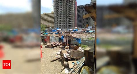 Encroachment choking Mithi River in F block in BKC - Times of India