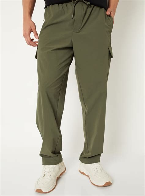 Buy Men Solid Cargo Track Pants Online at just Rs. 1199.0 ...