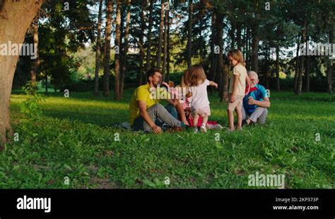 Parents and Kids Playing 的图像结果