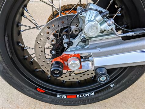 KTM 690 / Husqvarna 701 / Gas Gas 700 Axle Sliders - Warp 9 Racing