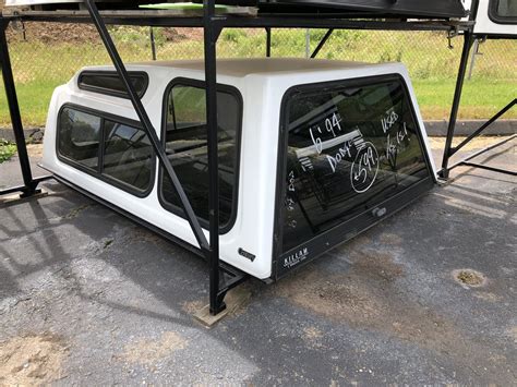 USED TRUCK CAPS & BED LINERS