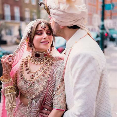 Kanika Kapoor stuns in lacey white pantsuit in these dreamy court ...