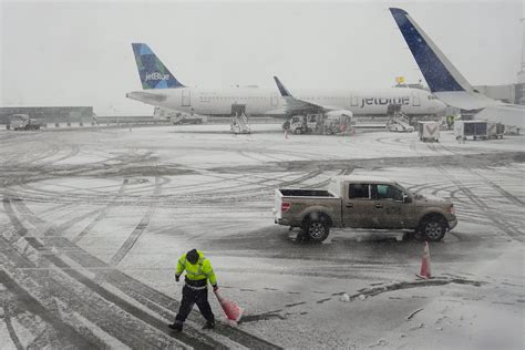 Hundreds of flights cancelled as winter storm wreaks havoc across ...