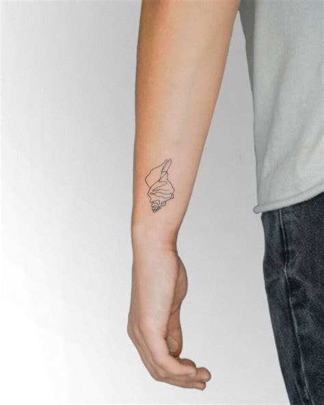 Shell Tattoo Meanings And 25 Jaw-Dropping Design Ideas