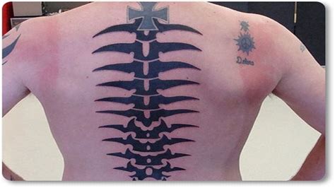 777 spine tattoo simple male