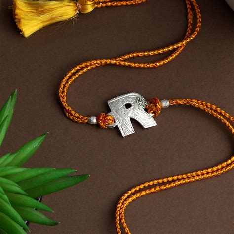 Completely handcrafted Rakhi, available in multiple variants. – Code Silver