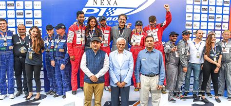 Narendra Kumar (R) attends the Nexa P1 Powerboat race held in Mumbai on ...