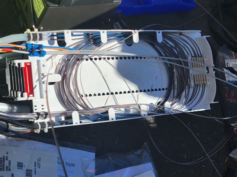 The inside of a fiber optic cable splice case : r/mildlyinteresting