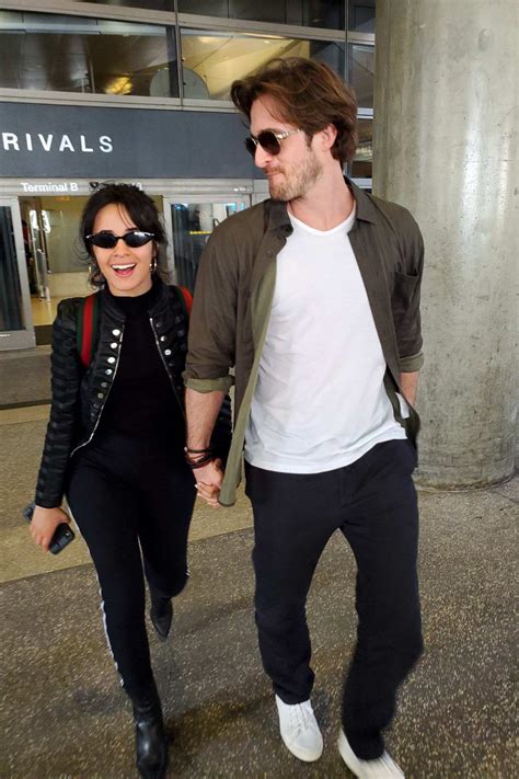 Camila Cabello and boyfriend Matthew Hussey hold hands as they arrive ...