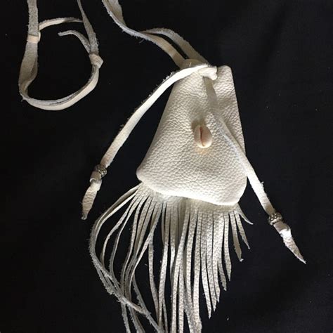 Image result for How to Design a Bag Using Cowrie Shells