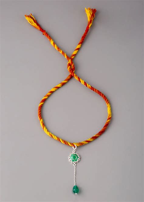 Get Anahata Chakra 'Rakhi & Lumba' Set - Silver at ₹ 2150 | LBB Shop