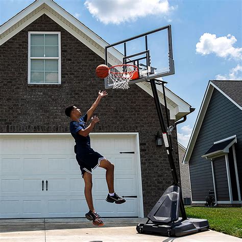 Spalding 54 in Angled Portable Pro Glide Basketball Hoop | Academy