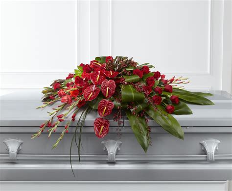 Peaceful Passage by Samuel's Florist | Casket sprays, Funeral flower ...